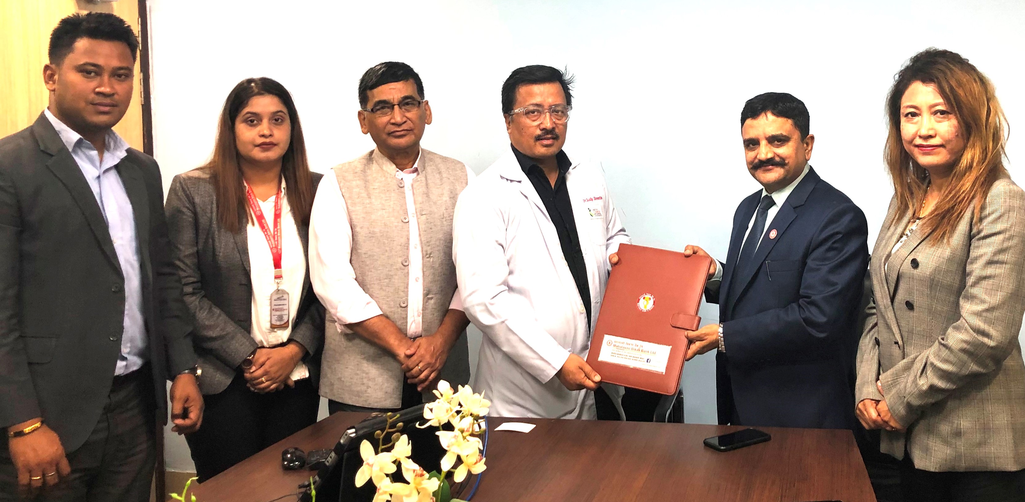 महालक्ष्मी विकास बैंक र नेपालक्यान्सर अस्पताल बीच सम्झौता