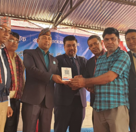 माछापुच्छ्रे बैंकको क्युआर कोड सेवा रुपन्देहिको योगिकुटी हाटबजारमा