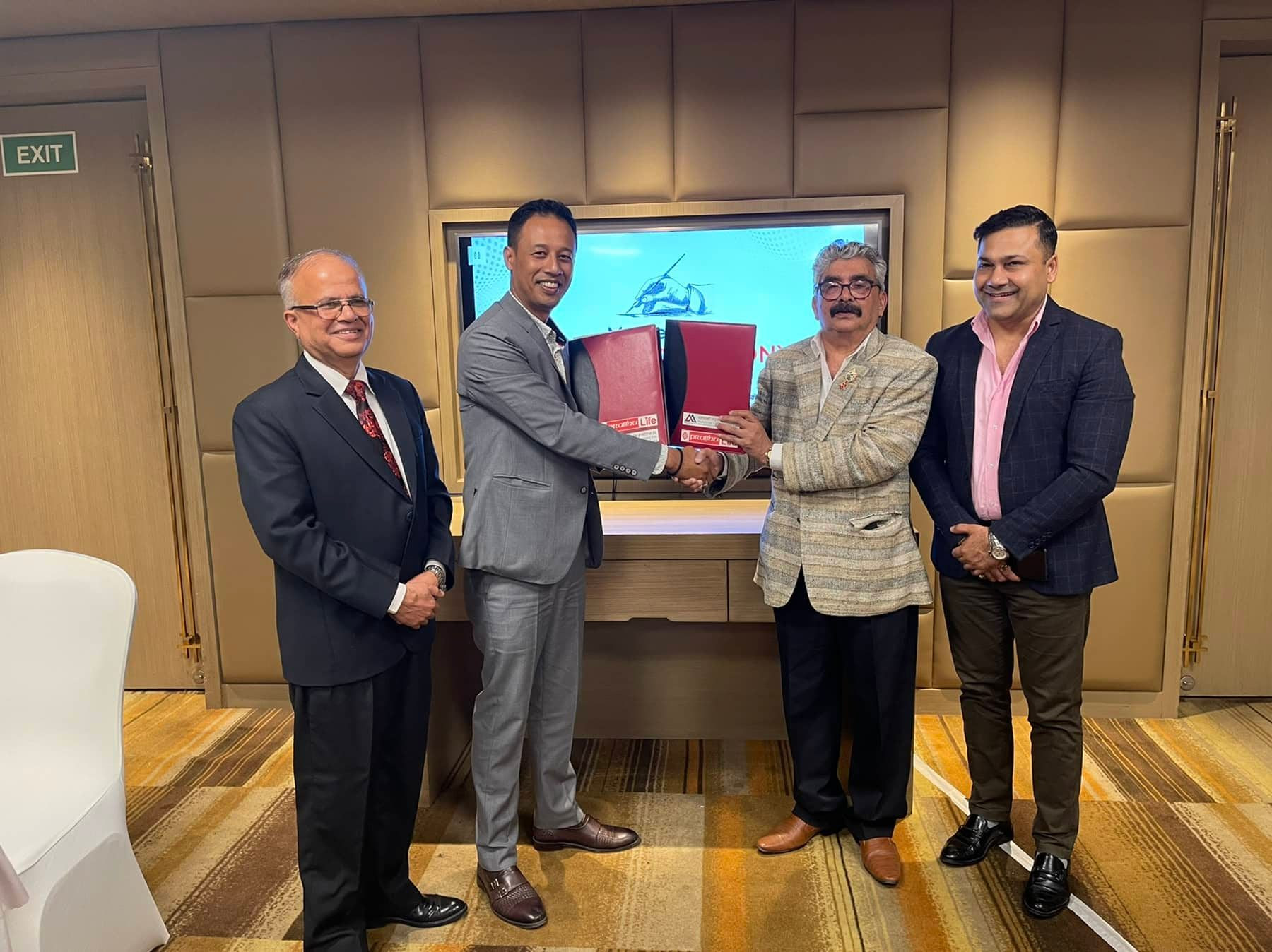 प्रभु लाइफ र महालक्ष्मी लाइफ विच मर्जरको संझौता